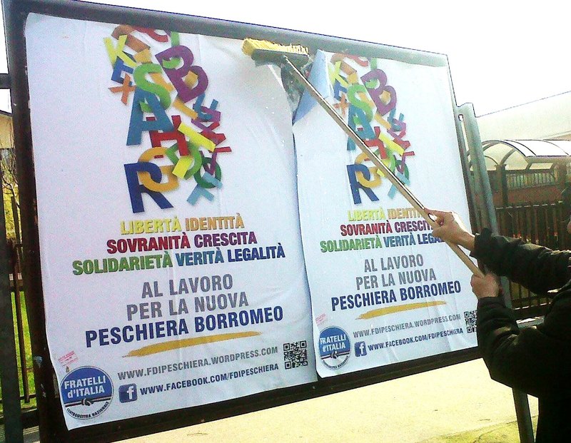 Manifesto del 2014 affisso a Peschiera Borromeo dai militanti di FdI 