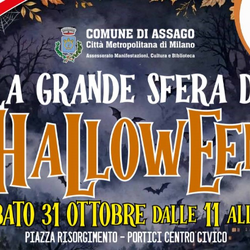 Personaggi in maschera e zucche illuminate nelle vie di Assago per Halloween 